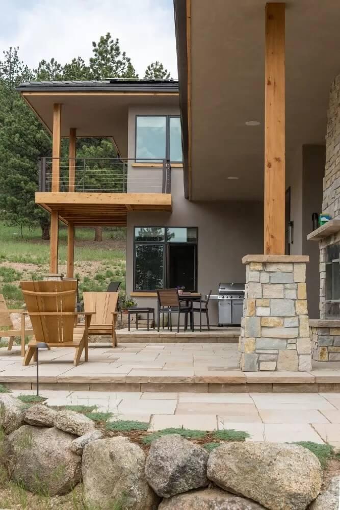 Admire the Elevated Balcony and Stone Patio Outdoors