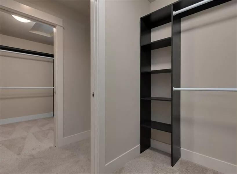 Expansive Walk-In Closet with Minimalist Shelving