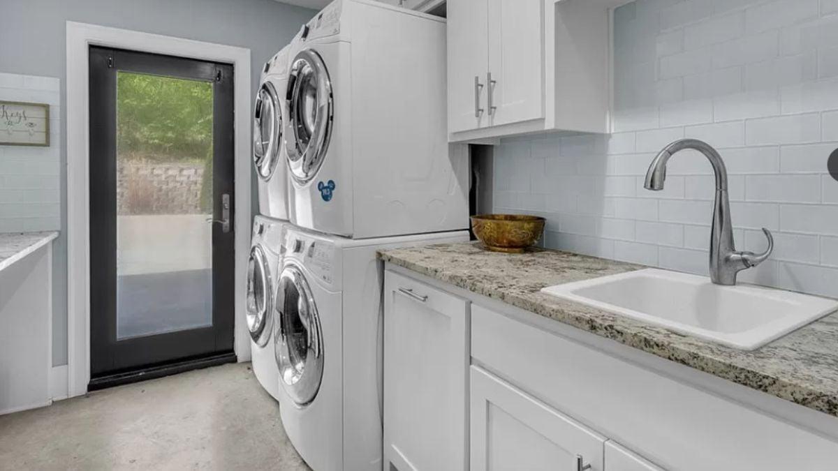 Functional Laundry Room with a Pop of Granite Countertops