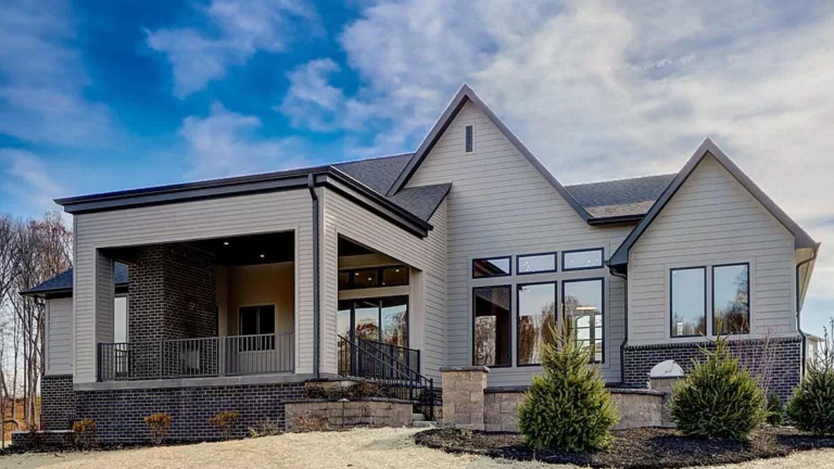 Step into This Modern Prairie Home with a Striking Wraparound Porch