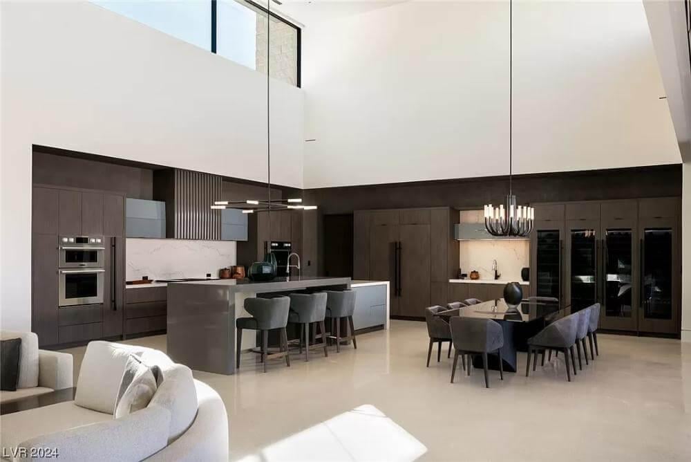 Expansive Kitchen and Dining Space with a Striking Double-Height Ceiling