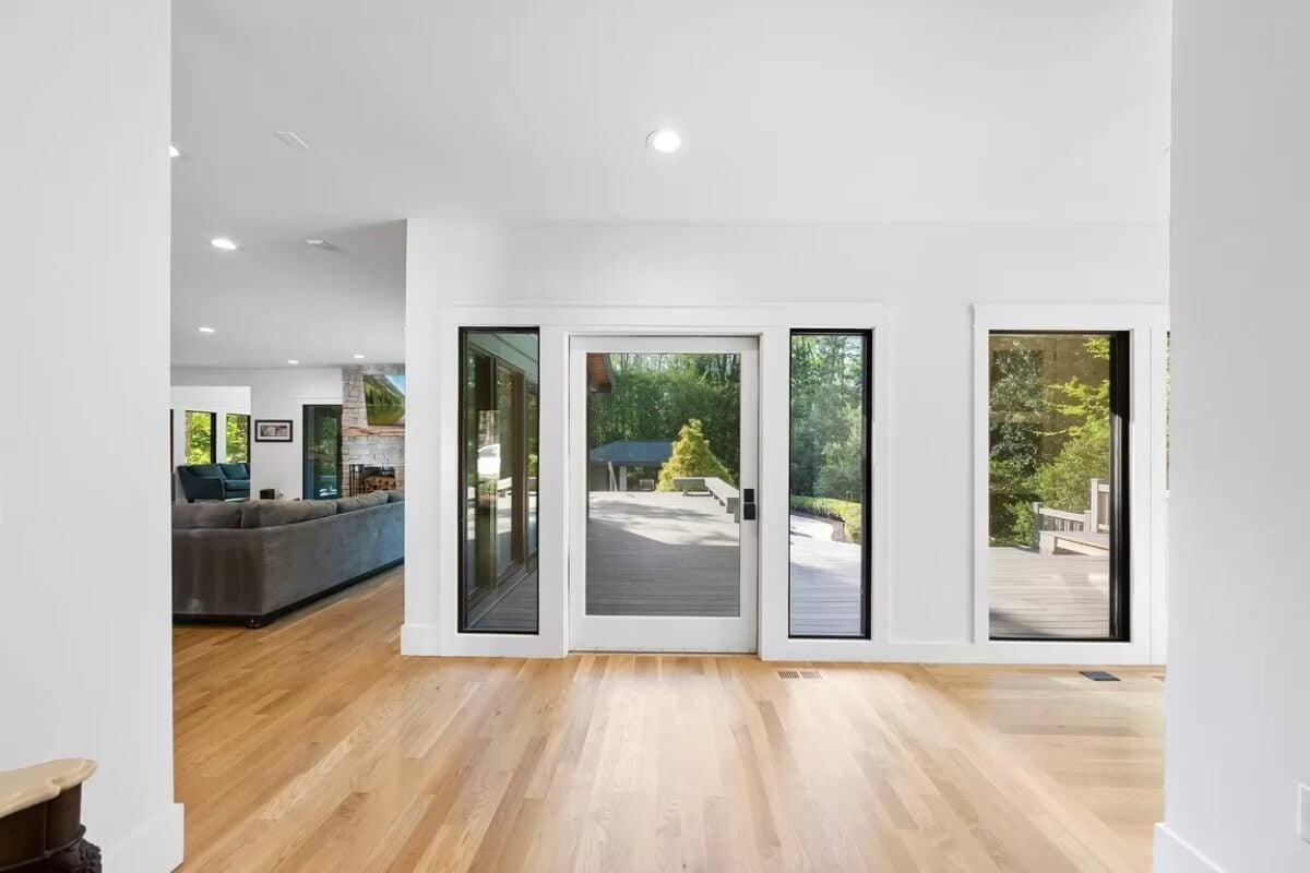 Expansive Views Through Floor-to-Ceiling Glass Doors