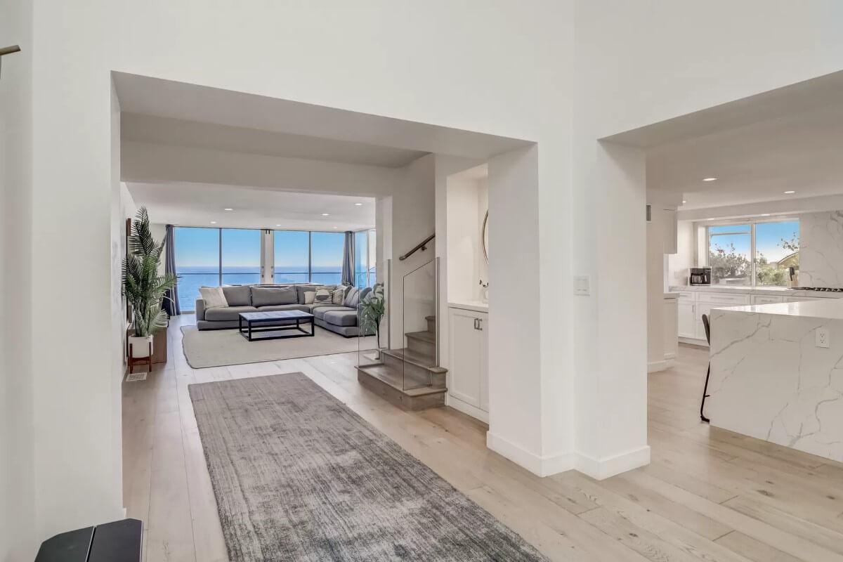 Expansive Living Room with Floor-to-Ceiling Ocean Views