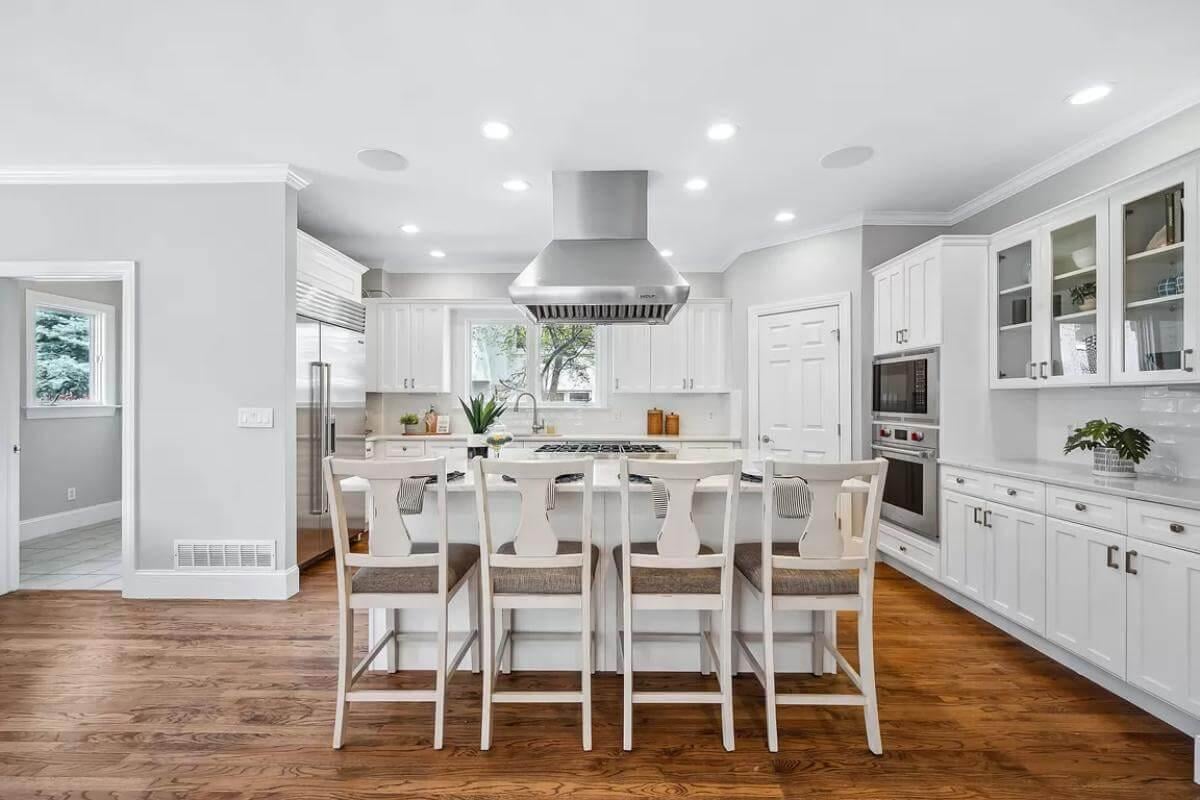Spot the Statement Hood in This Bright Kitchen Design