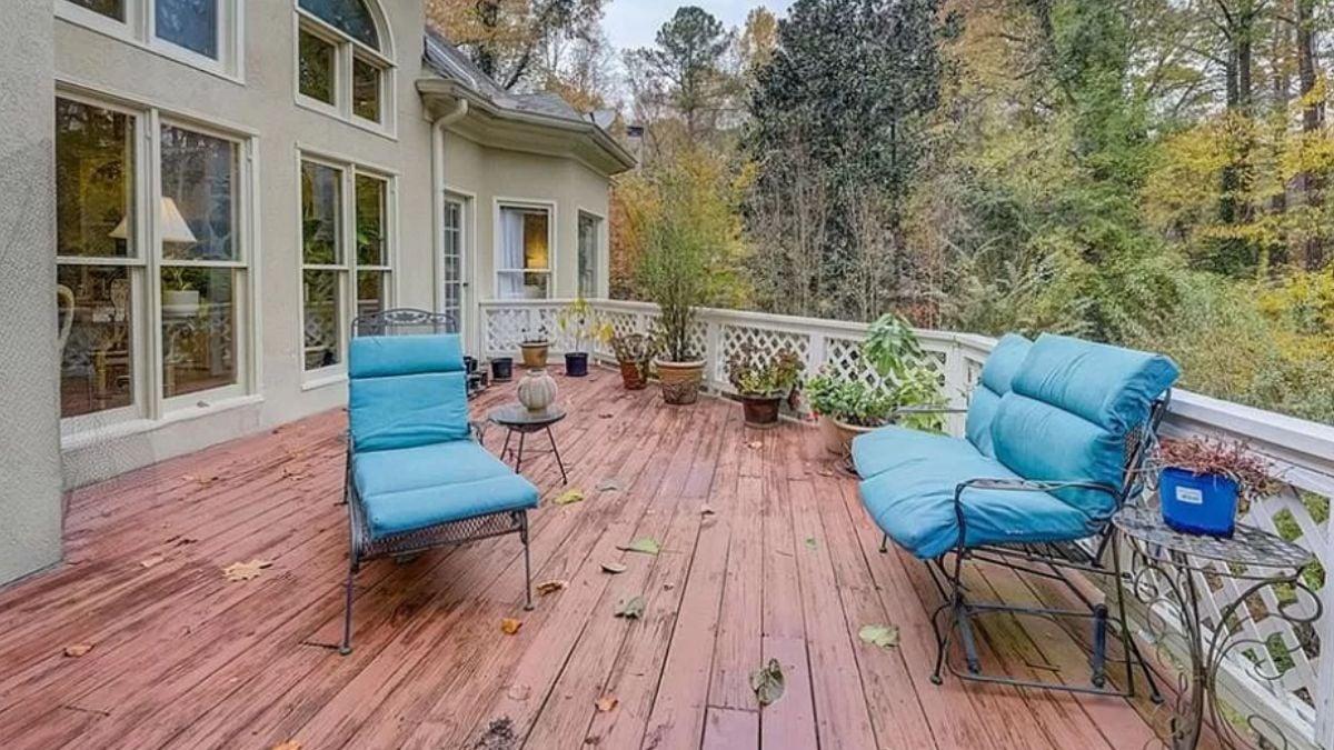 Spacious Deck with Colorful Cushions and Scenic Views