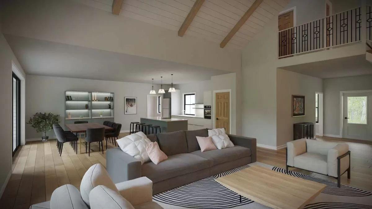 Open Living Space with Inviting Vaulted Ceilings and Cozy Loft View from Above