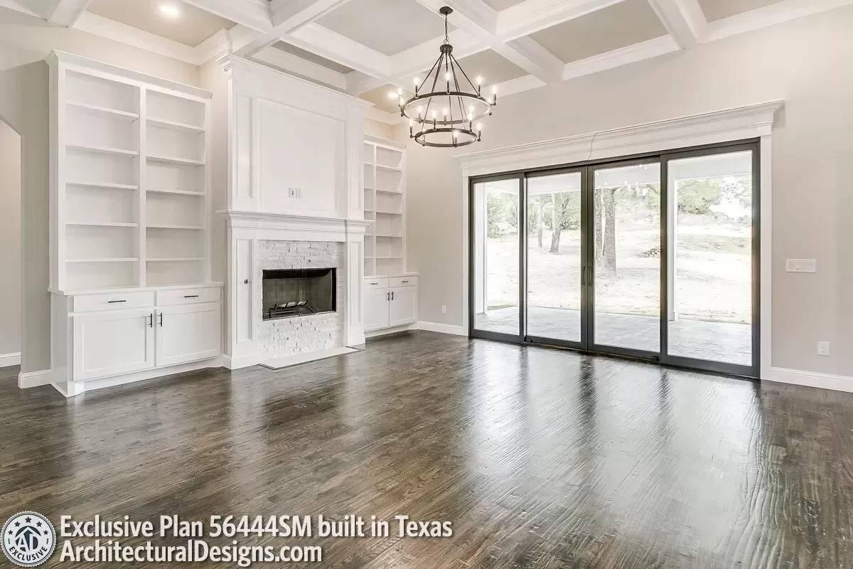 Classic Built-In Shelves Frame This Elegant Fireplace