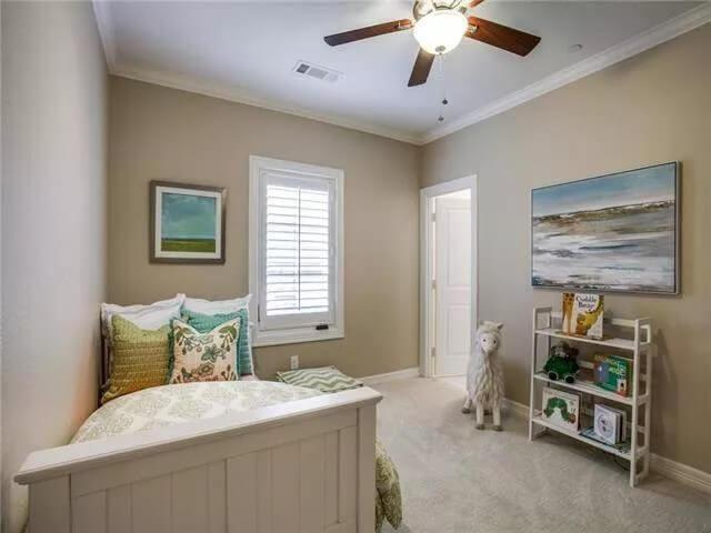 Simple Bedroom with Comfy Bedding and Whimsical Decor