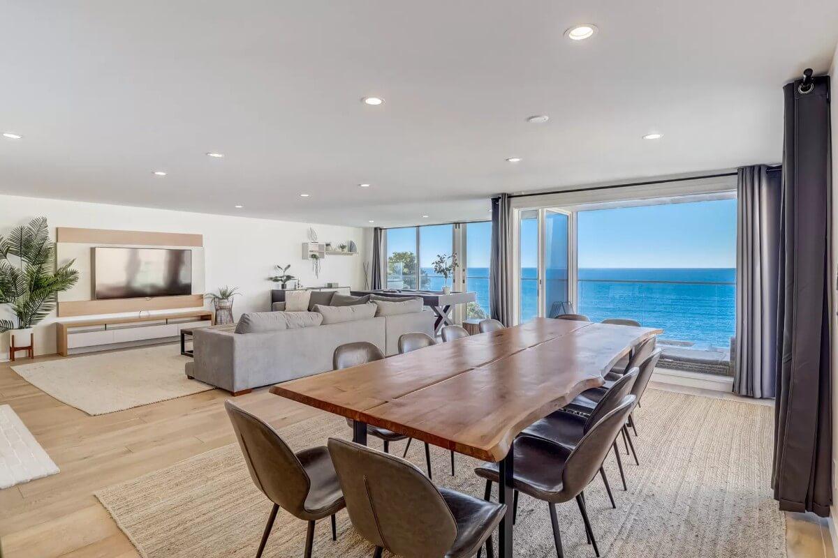 Seaside Dining with a Live Edge Table Stealing the Show