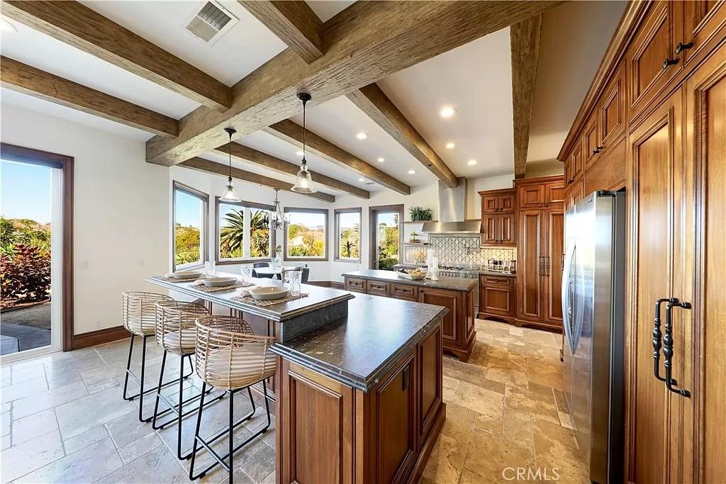 Wow, Check Out the Exposed Beams and Bold Wooden Cabinetry