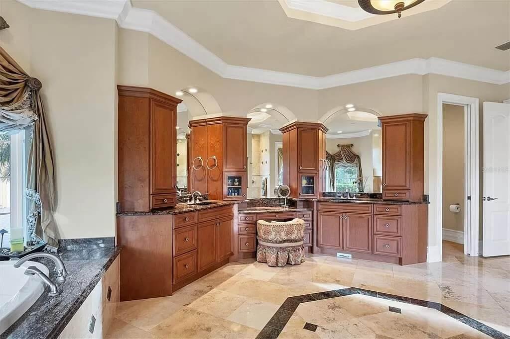 Luxurious Bathroom Suite Highlighting Elegant Vanity and Rich Wood Cabinetry
