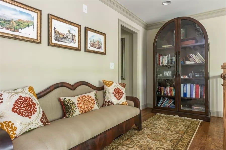 Notice the Elegant Details on This Craftsman Sitting Area with Its Curved Bookshelf