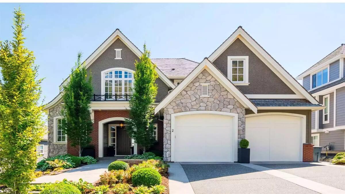 Check Out the Distinctive Gable Roof and Stone Accents on This Craftsman Exterior