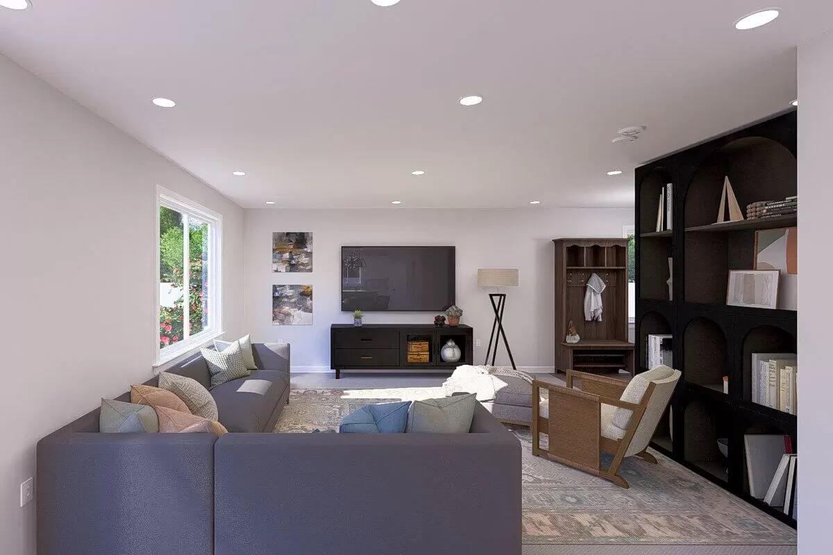 Spacious Living Room Featuring a Bold Dark Shelf
