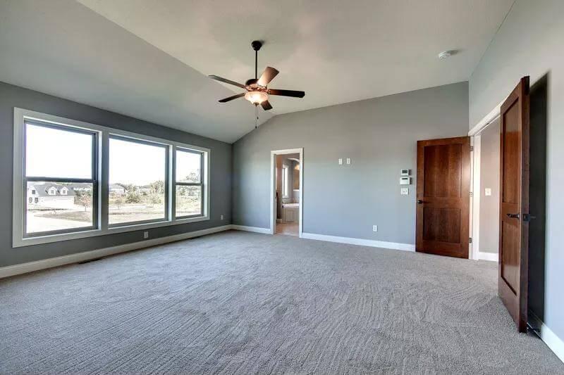 Vaulted Ceilings and Expansive Windows in This Craftsman Master Suite