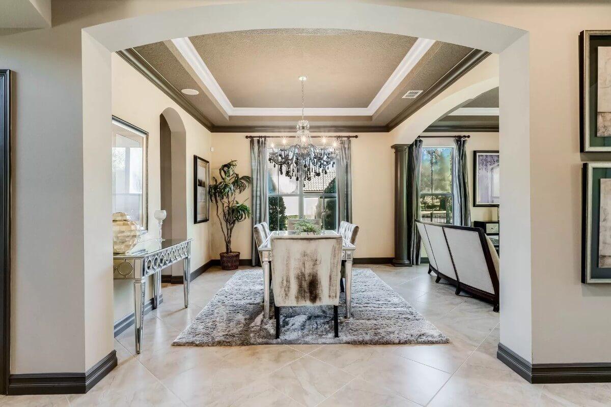 Elegant Dining Room with a Dramatic Chandelier Stealing the Spotlight