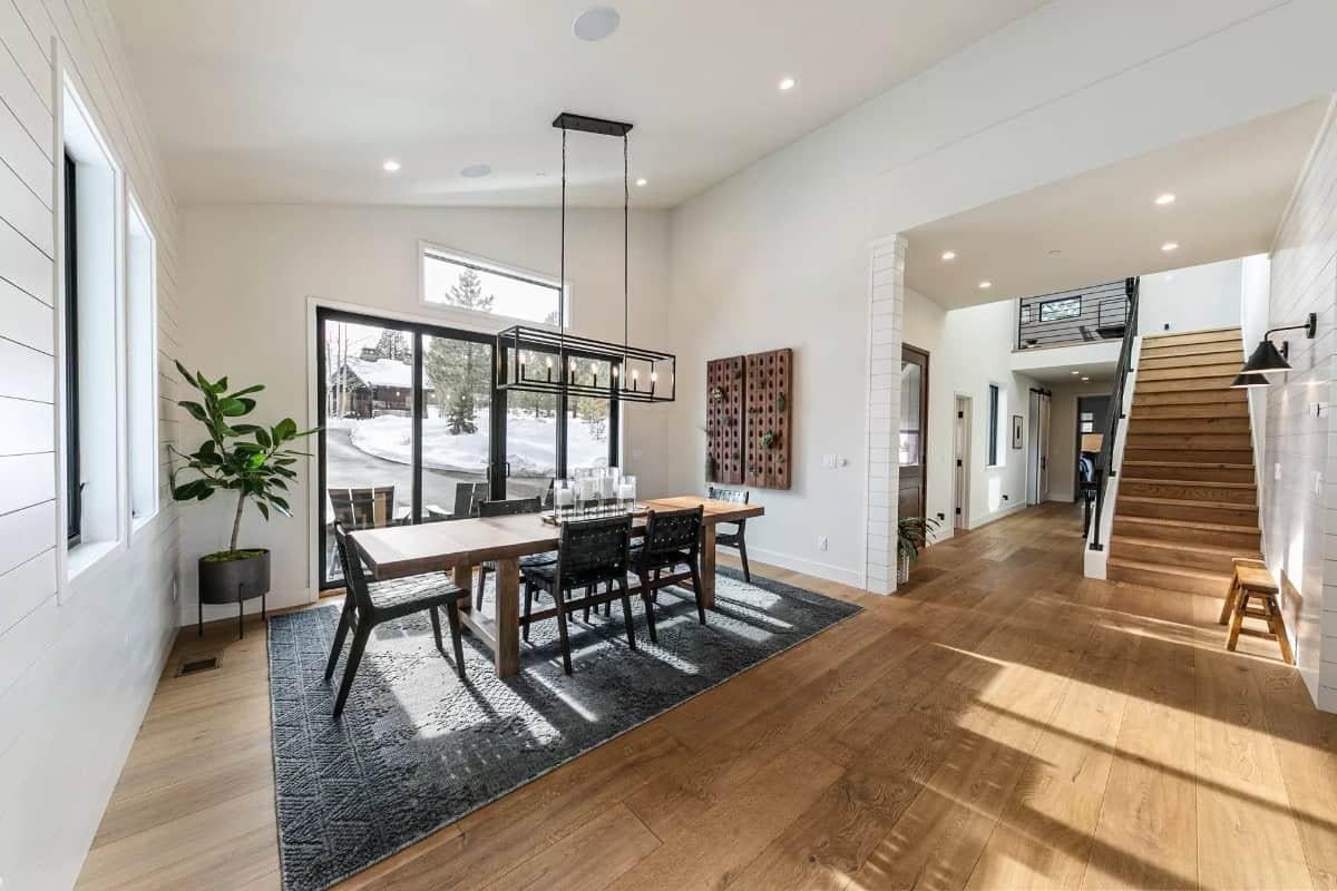 Check Out the Bold Dining Light Fixture That Really Anchors This Space