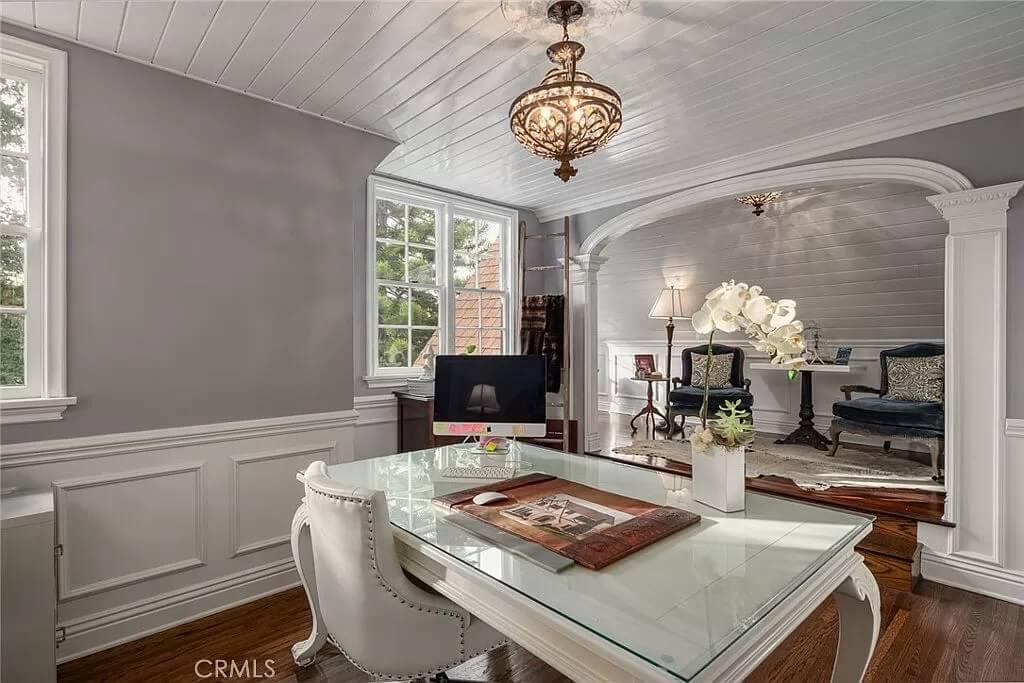 Sophisticated Home Office with Intricate Ceiling and Arched Alcove