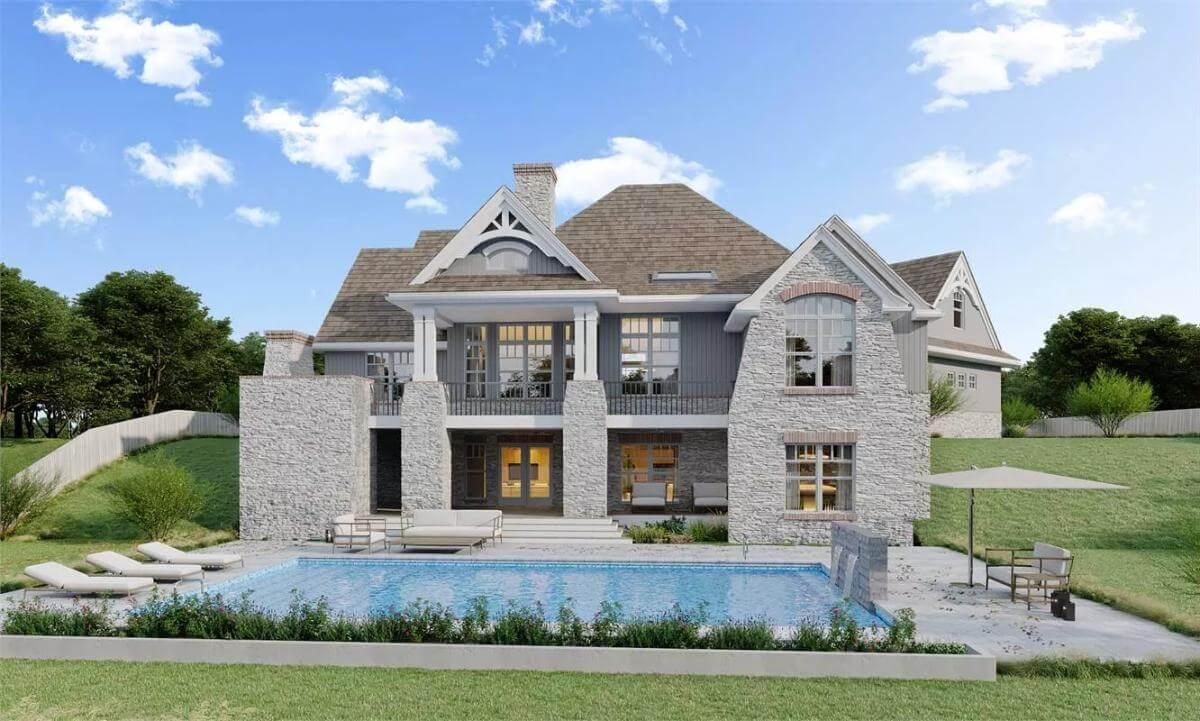 Elegant Poolside Views Complement This Classic Stone Facade