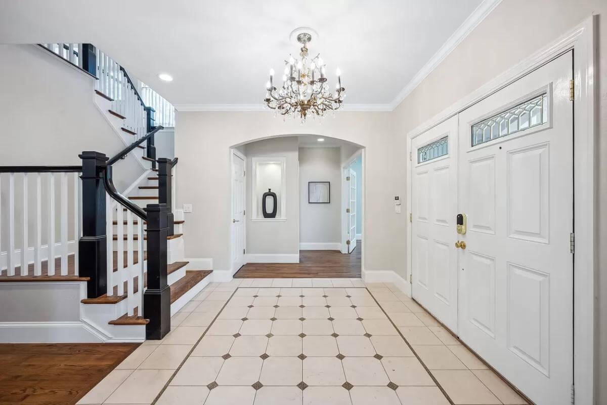 Step Into This Grand Foyer with Its Classic Chandelier