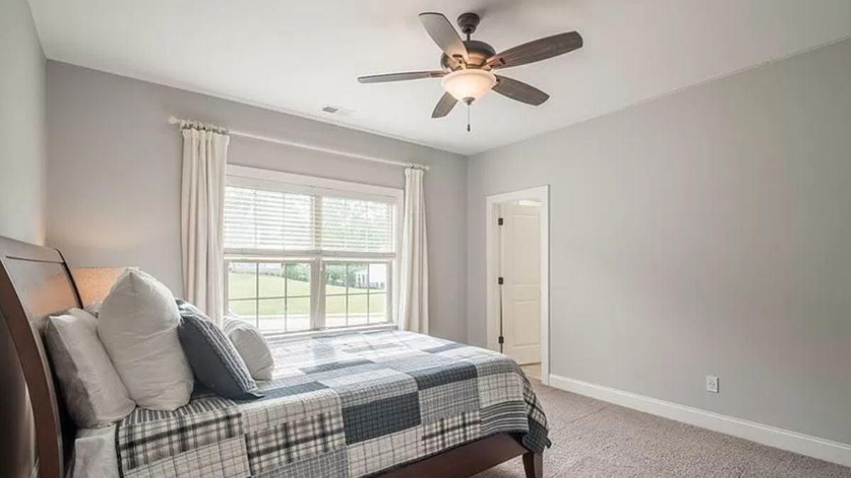 Simple Bedroom Design with a Cozy Patchwork Quilt
