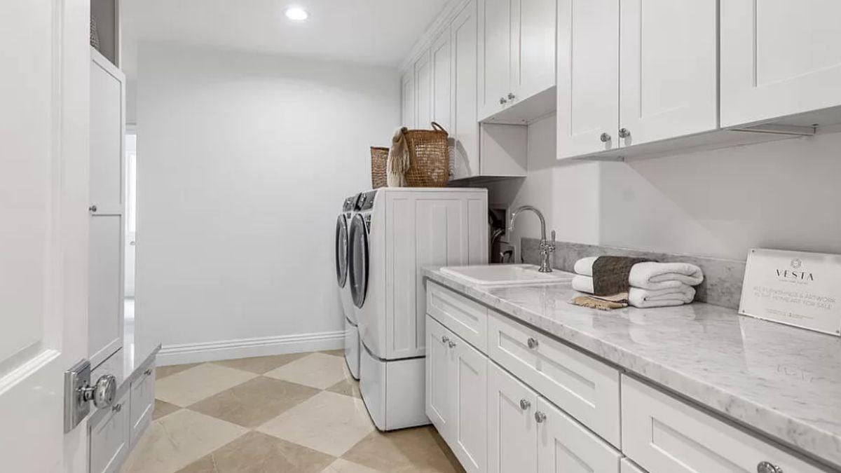 Notice the Clever Storage Solutions in This Bright Laundry Room