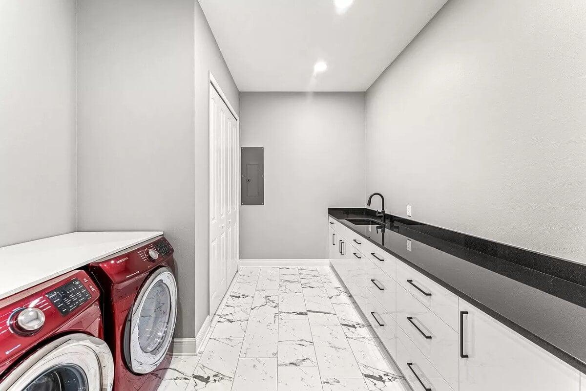 Spot the Bold Red Appliances in This Modern Laundry Room