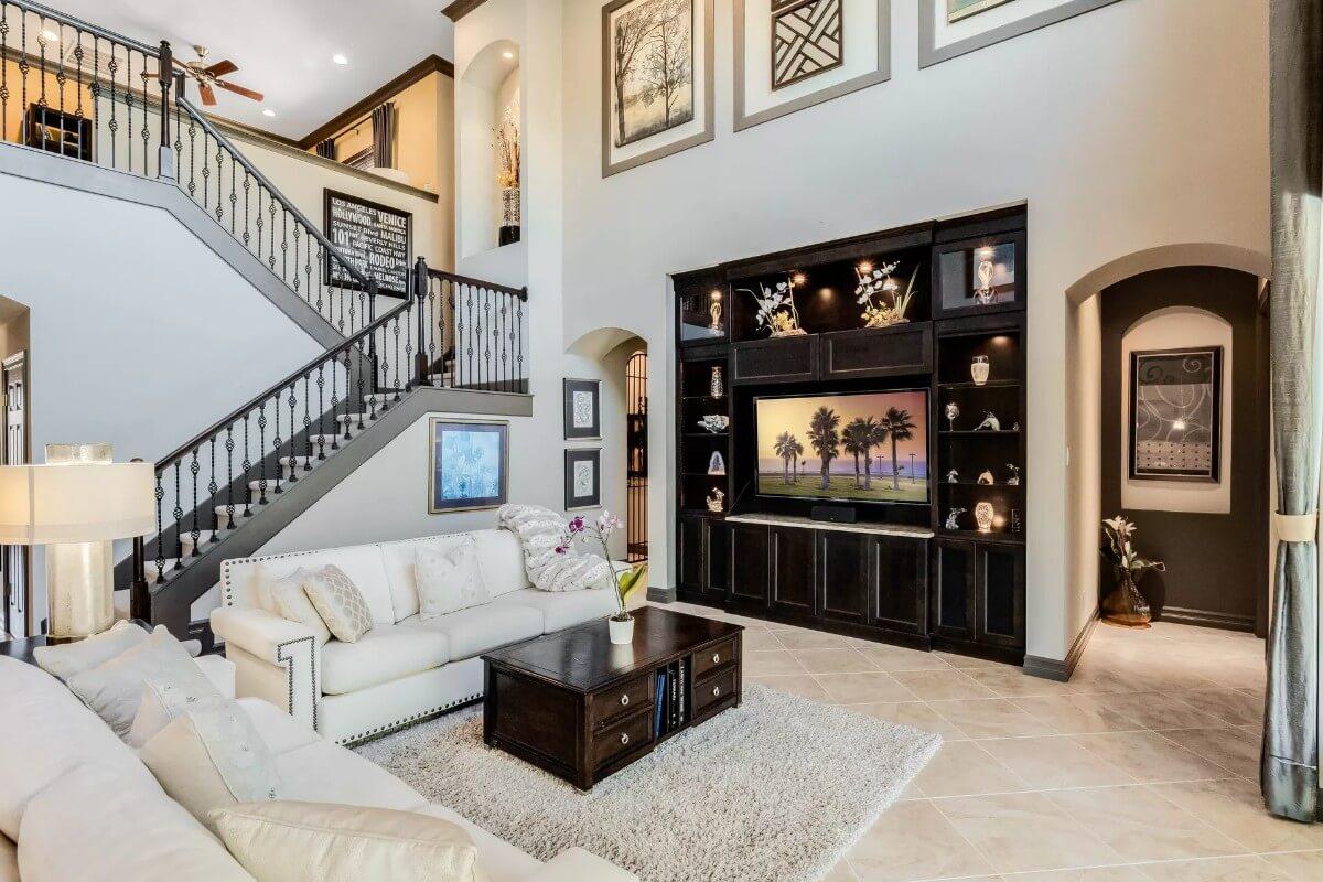 Look at That Loft Style Staircase and Custom Entertainment Center
