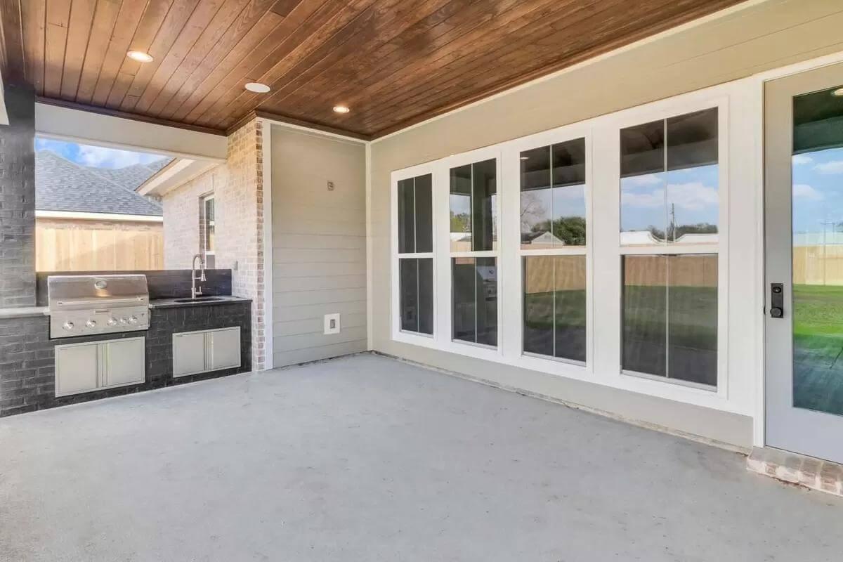 Stylish Outdoor Kitchen Area with a Handy Built-In Grill