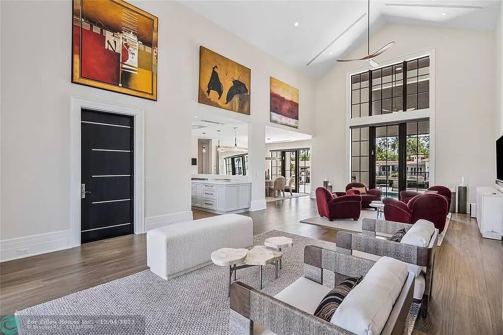 Admire the Vaulted Ceilings and Bold Artwork in This Living Room