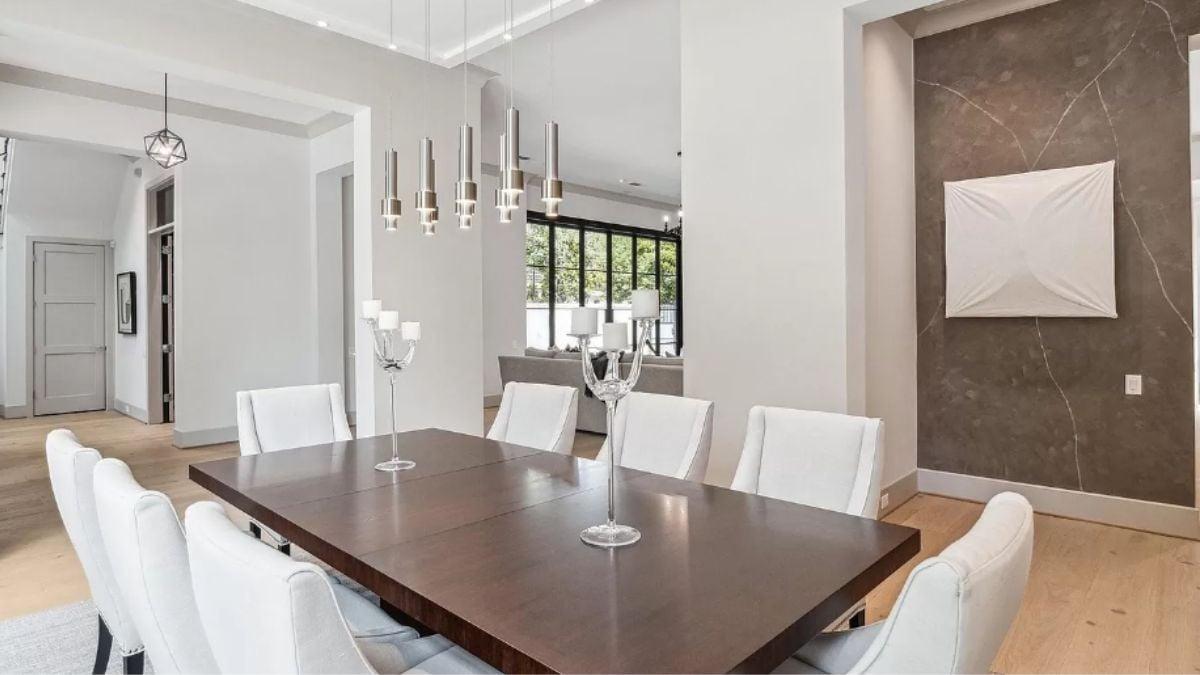 Check Out the Bold Pendant Lights in This Minimalist Dining Room