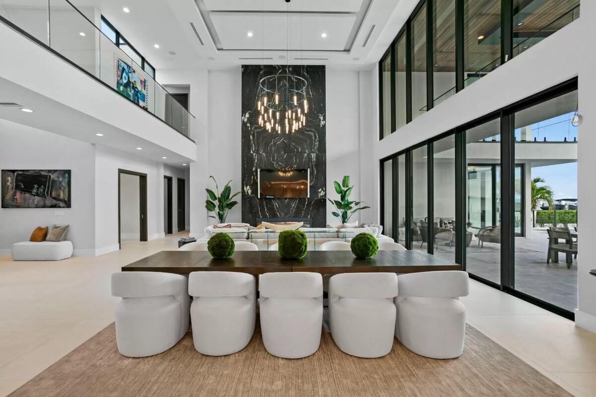 Check Out This Sophisticated Living Room with Dramatic Marble Accent Wall