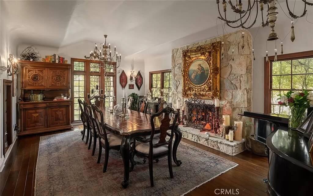 Elegant Dining Room with Timeless Wooden Furniture and Stone Fireplace