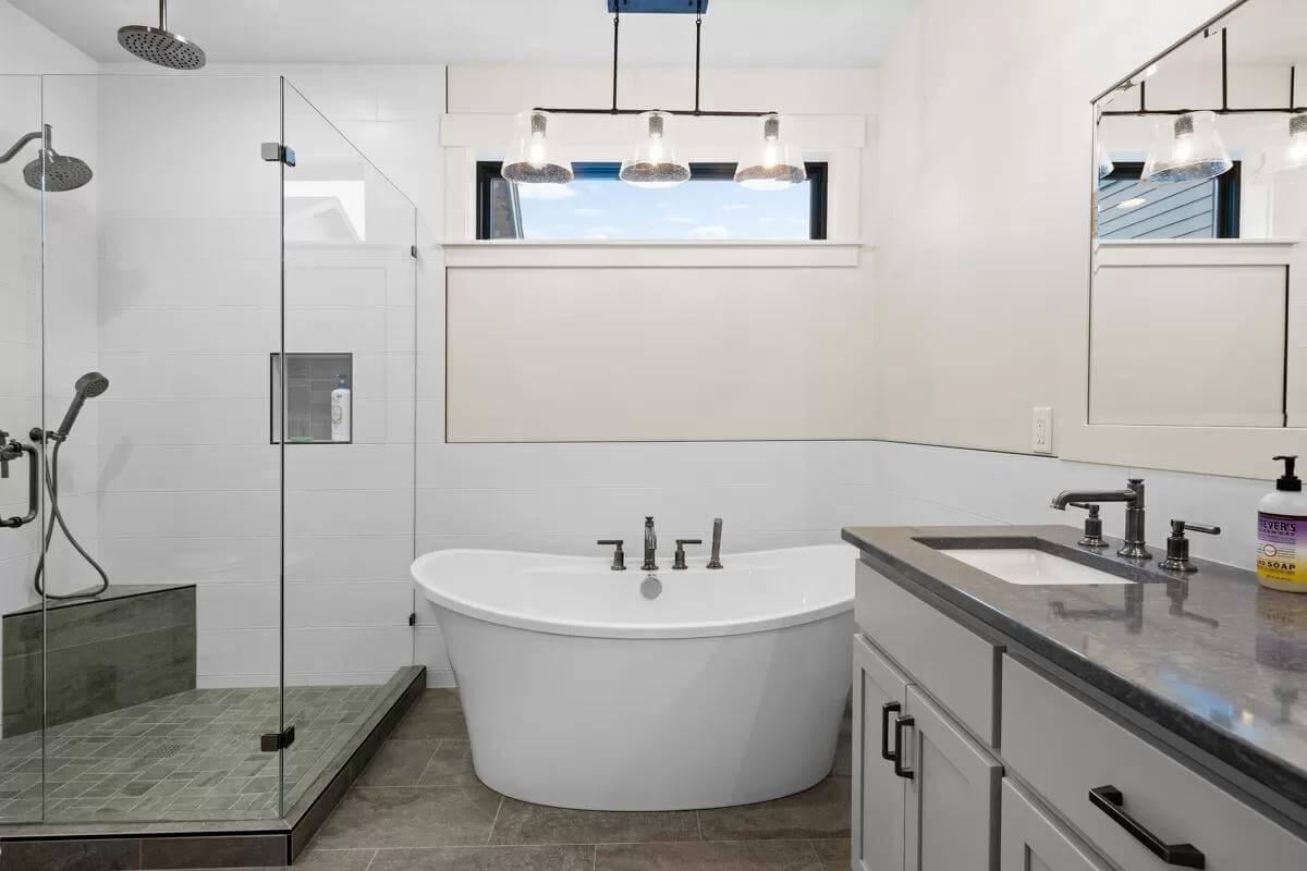 Freestanding Bathtub as the Focal Point in This Refreshing Bathroom