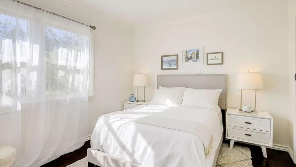 Bright and Airy Bedroom with a Simple Tufted Headboard
