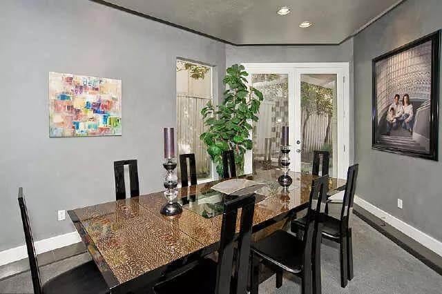 Contemporary Dining Room with a Vibrant Pop of Colorful Art