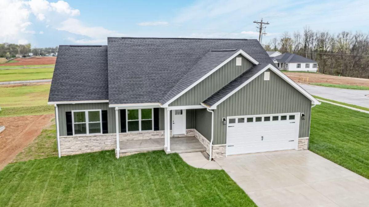 Notice the Neat Gables and Stone Trims on This Ranch Style Home
