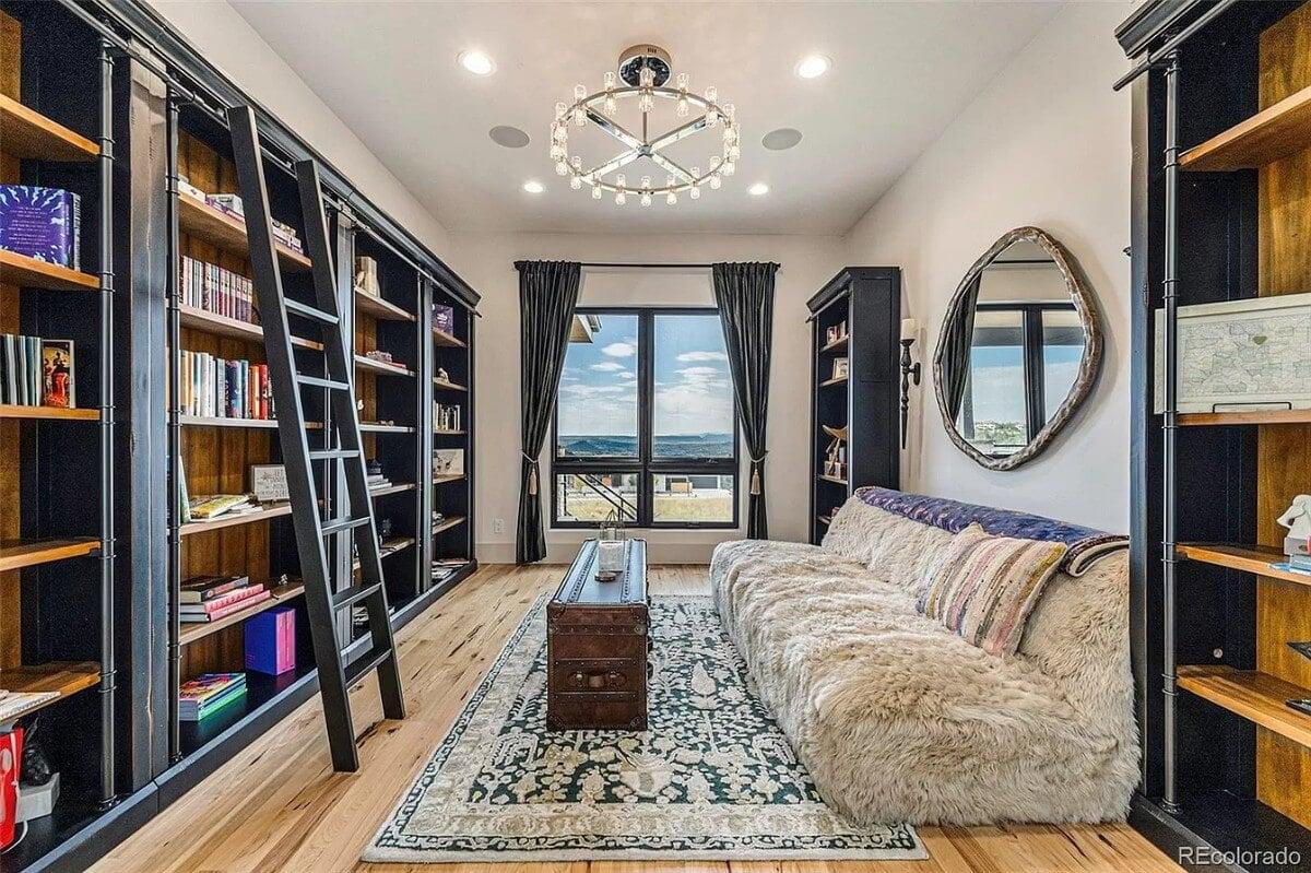 Check Out This Cozy Library with a Chic Ladder and Majestic Views