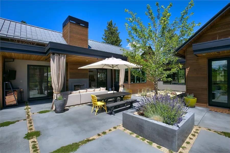 Outdoor Paradise with a Chic Fireplace and Pergola