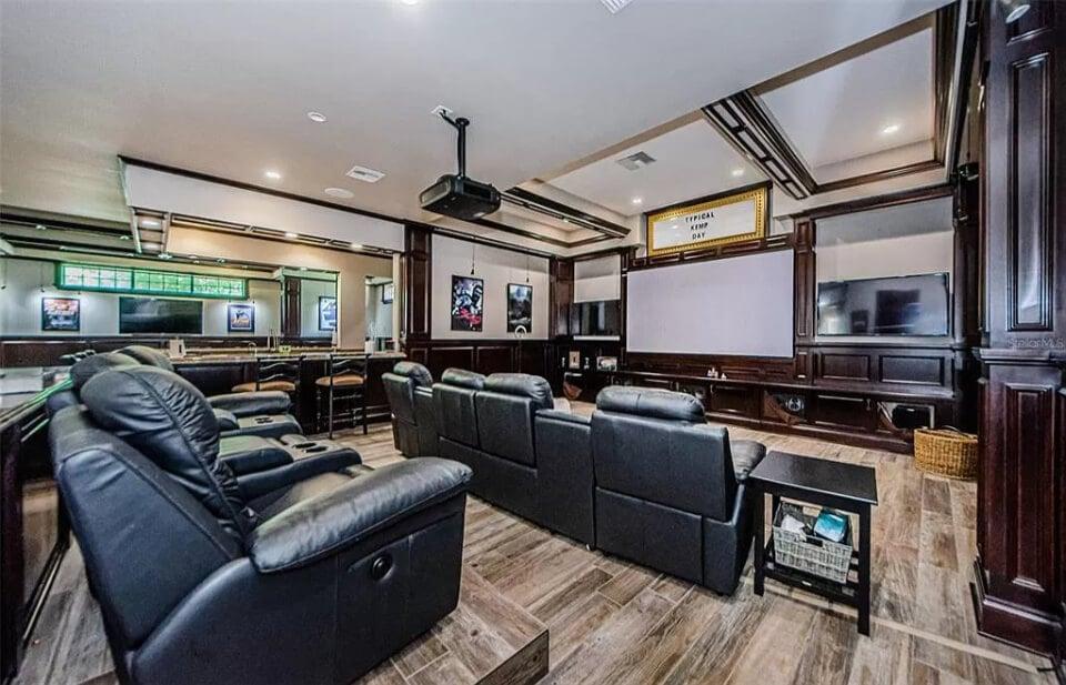 Step Into This Home Theater with Plush Recliners