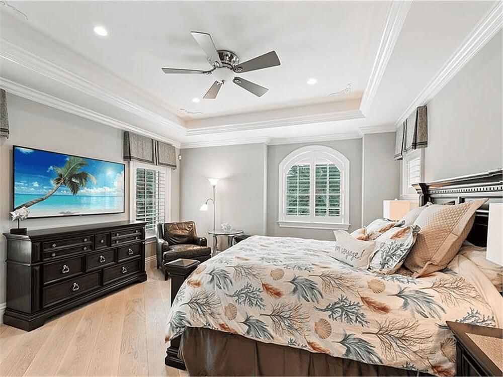 Relax in This Coastal-Inspired Bedroom with a Captivating Tray Ceiling
