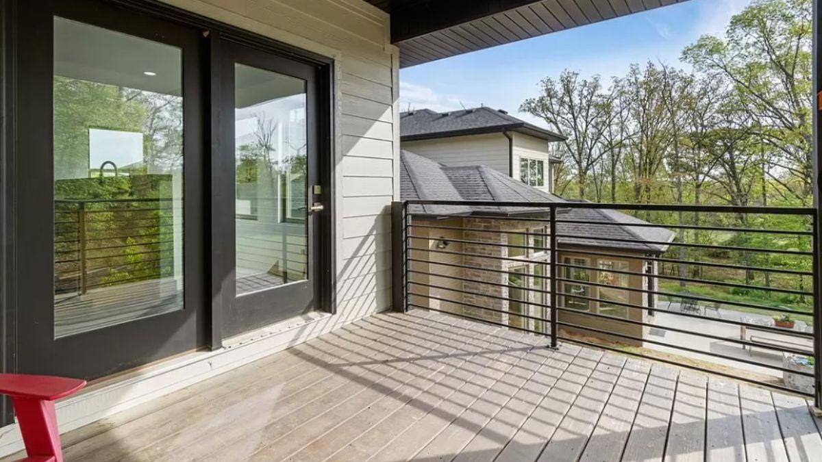 Enjoy the Fresh Air on This Cozy Second-Floor Balcony