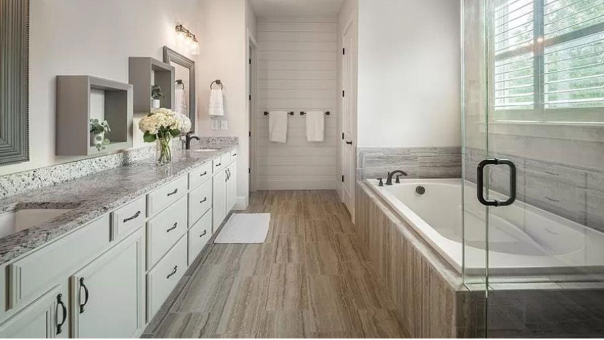 Spacious Bathroom Showcasing a Seamless Glass-Enclosed Shower