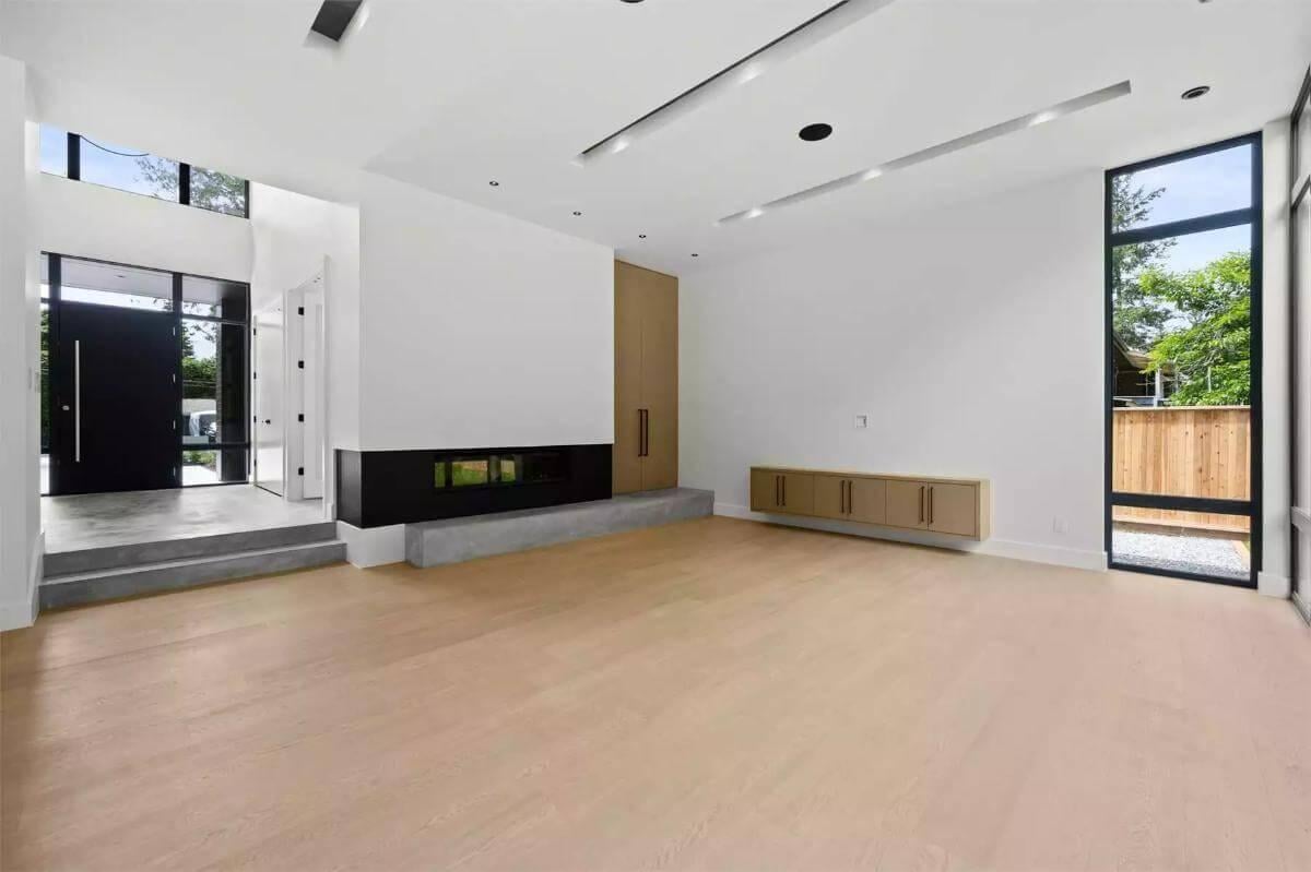 Sleek Minimalism: Explore the Floating Cabinet and Linear Fireplace
