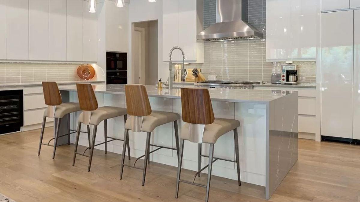 Explore This Sleek Contemporary Kitchen With a Waterfall Island