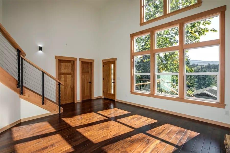 Natural Light Pours in Through Expansive Windows in This Modern Space