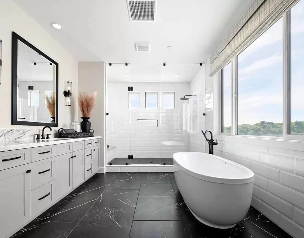 Modern Bathroom Oasis with Freestanding Tub by the Large Window