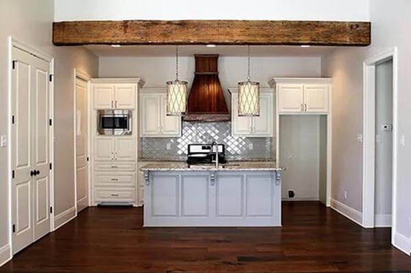 Notice the Bold Wooden Beam and Those Striking Pendant Lights