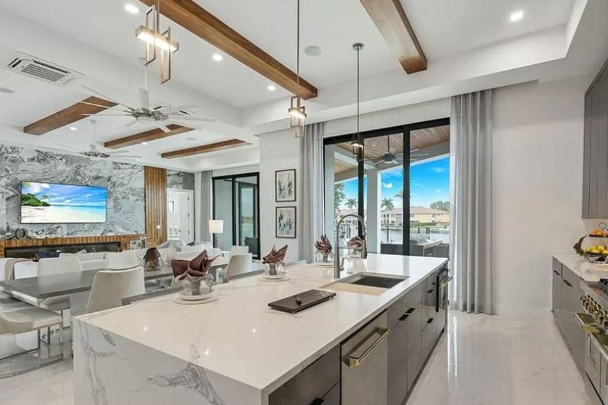 Check Out the Marble Island in This Open-Concept Kitchen