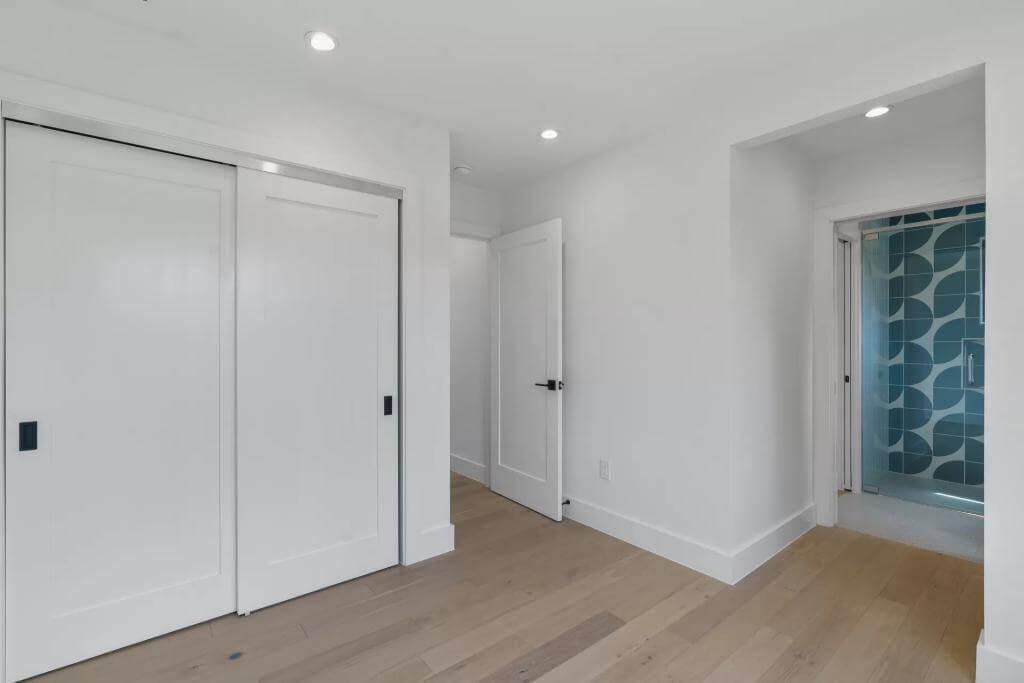 Spot the Bold Geometric Tiles Through This Minimalist Hallway
